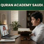Muslim student in Saudi Arabia attending an online Quran lesson with a teacher through a laptop at home